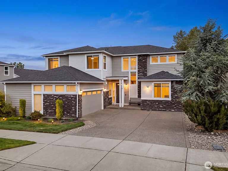 1113 25th Avenue Ct SW, Puyallup — front exterior at dusk
